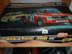 A Scalextric 300 electric model racing set.