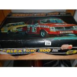 A Scalextric 300 electric model racing set.