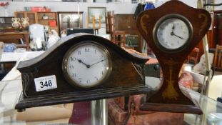 2 small wood mantel clocks, one being Napoleon hat shaped and the other lyre shaped.