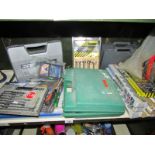 A selection of power tool accessories and consumables including welding rods,