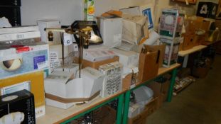 A large quantity of lighting and accessories including wall lights, lamp shades etc.