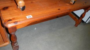 A pine coffee table.