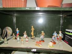 A mixed lot of figures, cottages etc.