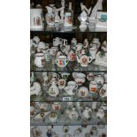 A large collection of crested china.