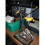 A bench drill,