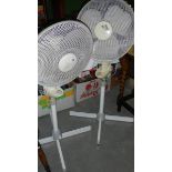 2 floor standing fans.