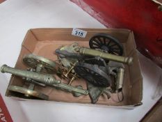 A mixed lot of brass ware including cannons,