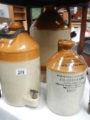 3 stoneware storage jugs (one with tap) including Potter Bailey, Worthing, J.H.