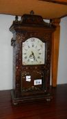 A mantel clock,.