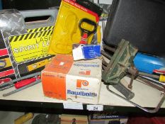 A mixed lot of tools including tripod spirit level, power drill, vice etc.