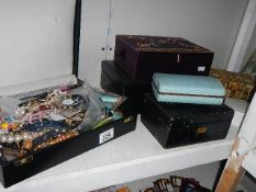 A mixed lot of costume jewellery and 2 jewellery boxes.