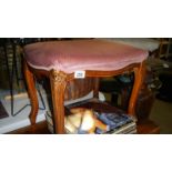 A dressing table stool.