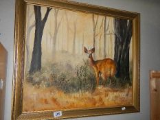 An oil on board study of a deer in woodland signed Giffney.