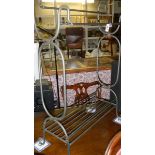 A wrought iron towel rail.