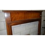 A mahogany fire surround.