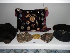 A collection of costume jewellery, 3 clutch bags, compact and fur hat with shoulder cape.