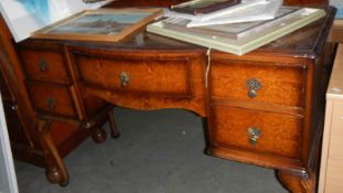 A walnut dressing table.