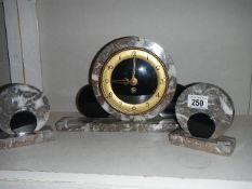 A 3 piece clock garniture.