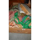 A box of curtain ties, buttons etc,