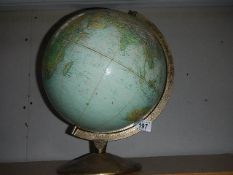 An old globe with longitude and mileage markers.