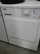 A Meile tumble dryer.