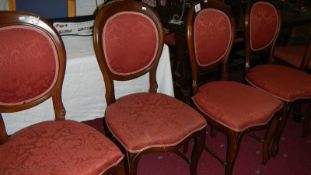 A set of 4 mahogany framed chairs.