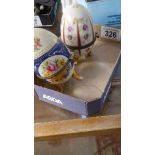 2 egg shaped trinket boxes.