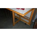 A drop leaf kitchen table,