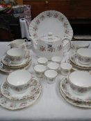 26 pieces of Minton tea ware.