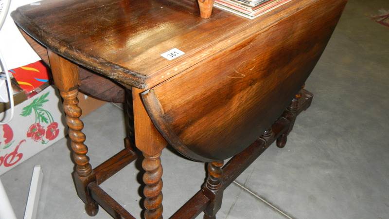 An oak barley twist gate leg table.