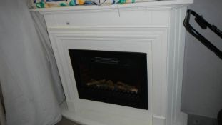 A electric fire and surround.