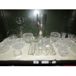 A mixed lot of glass ware including rose bowls, vases, butter dish etc.