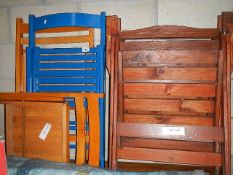 A quantity of folding chairs,