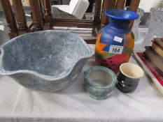 A hand painted vase, a pottery 'butterfly' bowl and 2 items of studio pottery.