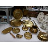 A mixed lot of brass ware including candle holder, vase, dinner gong etc.