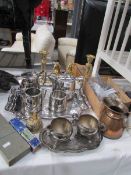 A mixed lot of metalware including teaware, pair of brass horses, copper jug, cutlery, candlesticks,