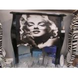 A 2 drawer chest depicting Marilyn Monroe.