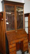 A mahogany bureau book case,.