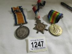 A WW1 war medal, victory medal and star for Pte. J. W. Shocksmith, Lincolnshire regiment.