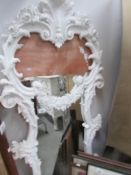 A white painted ornate framed mirror, a/f.