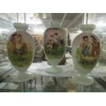 A set of 3 Victorian hand decorated vases.