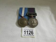 A Northern Ireland General Service medal and a Unfirye medal for D Royston.