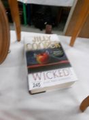 A signed copy of Wicked by Jilly Cooper.