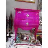 A pink 2 drawer chest,