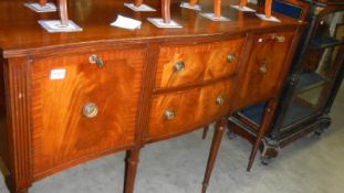 A mahogany sideboard.