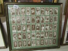 A framed and glazed set of Churchman boxing personalities cigarette cards.