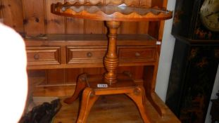 A small oval mahogany oval table.