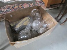 A box of vintage industrial light bulbs.