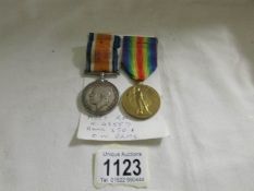 A WW1 War medal and Victory medal for D W Evans, RN.