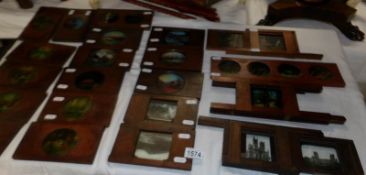 A collection of magic lantern slides all in wood frames including Lincoln Cathedral,